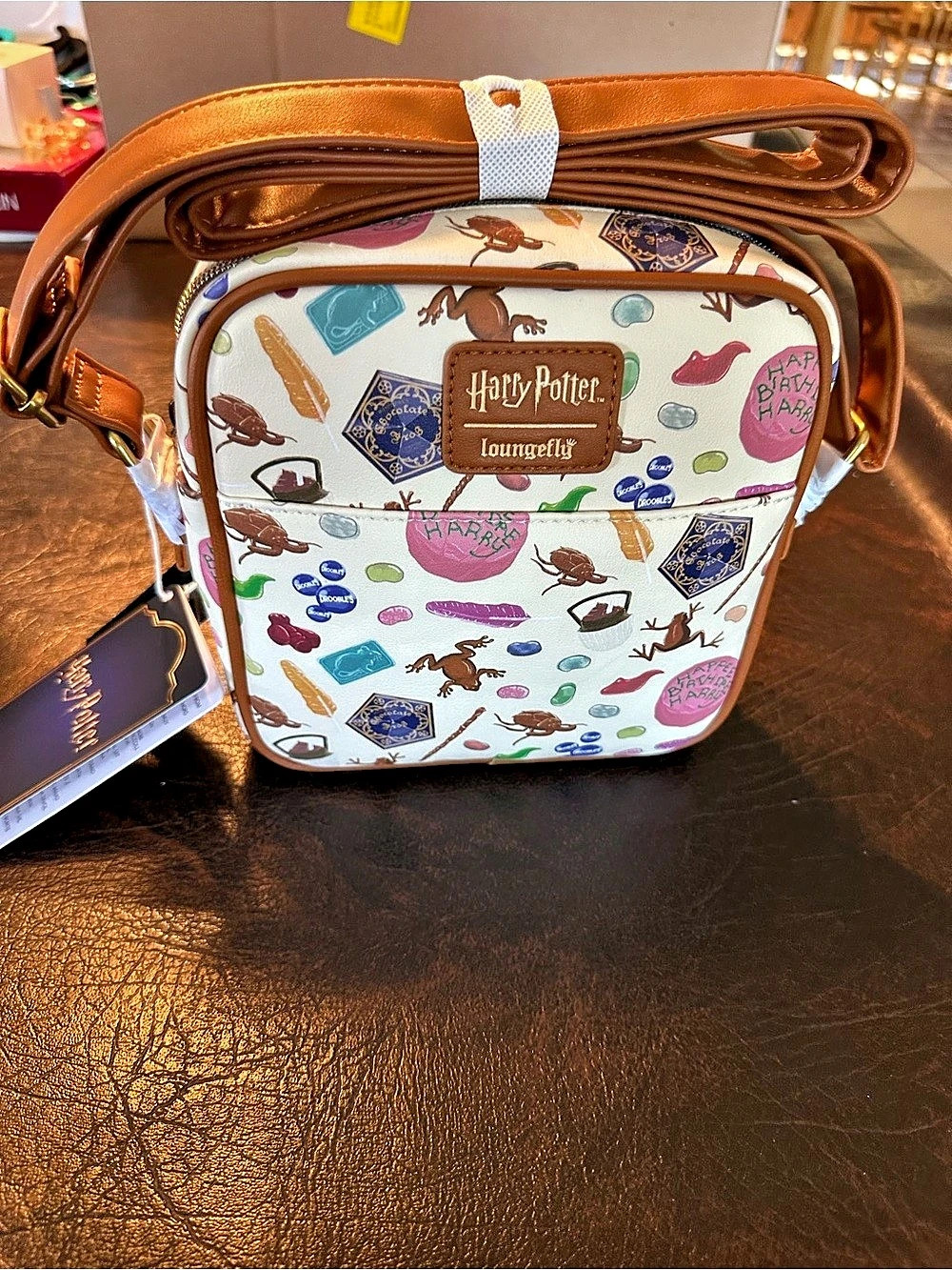 Loungefly Harry Potter Honeydukes Treats All Over Print Crossbody Bag Honeydukes